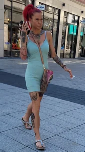Candid Girl in Short Dress With a Tattooed Body Street Creepshots Gallery