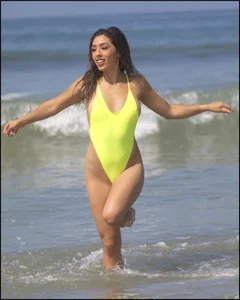 Sexy ass beach babe in a yellow thong swimsuit