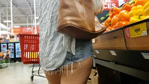 Cheek Peek in cut-off shorts