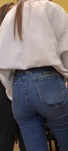 Girl is showing her blue jeans