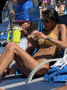 Fake tits in a bikini