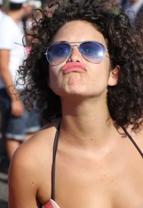 Boobs out in public in either bikini tops or bras