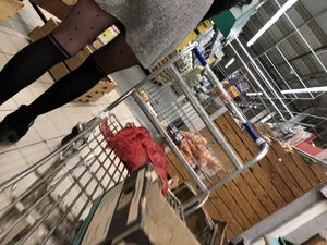 Hot milf wearing a skirt and black pantyhose with dots at the grocery store creepshot