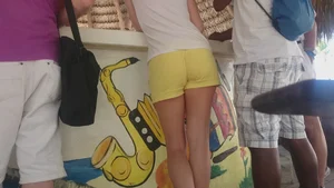 Milf in yellow shorts with vpl and a wedgie