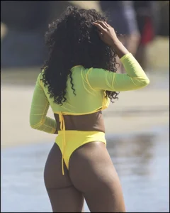 2 amazing candid black girls at the beach in thong bikinis with perfect asses