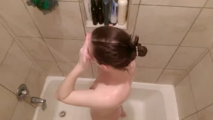Girl Standing in a Shower