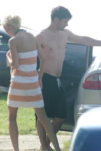 Blonde babe changing into and out of bikini and shows her tits