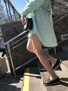 Girl in a Dress With Sexy Legs in Subway and on a Street