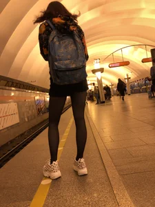 Skinny Girl in a Skirt and Black Pantyhose Subway Candid