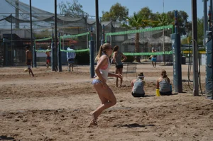 Beach volleyball blonde looking sexy and showing her body off