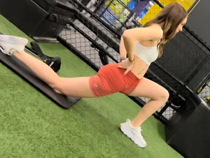 Beautiful girl bending over and spreading legs