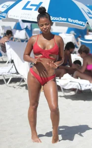 Christina Milian in red bikini in Miami with hard nipples