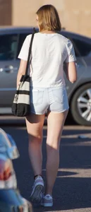College babe in the parking lot in little denim shorts