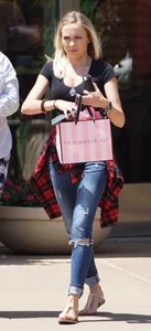 Hot blonde in jeans after shopping at Victoria Secret