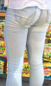 Girl in wet jeans making them semi see through