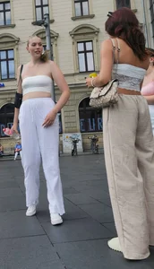 Long blonde braless in a white outfit (many pictures)