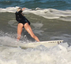 Hot surfer chicks out in the water