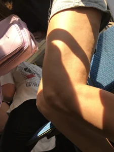 A Hot Candid Girl in Blue Denim Shorts Sitting in a Public Bus, Closeups of Her Legs And Upshorts Creepshot