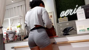 Candid ebony babe with an amazing ass and vpl in grey Nike spandex shorts