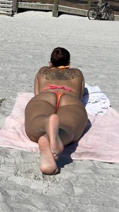 Beautiful Latina body in bikini at beach. Sexy soles too