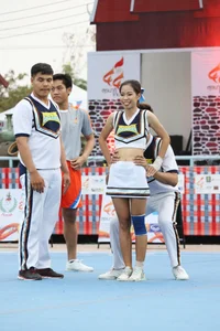 Bunch of athletic Thai cheerleaders at a competition