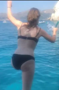 Sexy brunette sucking snorkel like a slut