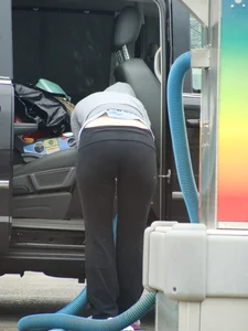 Girls cleaning their cars in jeans and pants