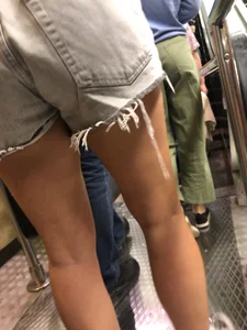 Hot Legs and Ass in Denim Fringe Shorts Escalator Closeup Creepshots
