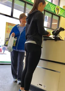 Thick booty girl shopping at Dollar Tree in leggings