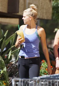 Sexy blonde and friend walking in leggings