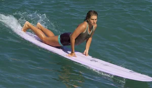 Candid surfer babes on the beach and in bikinis