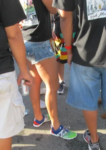 Brunette babe standing around in denim shorts