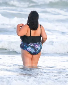 Extra thick girl at the beach in a bikini