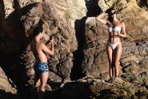 Iris Mittenaere in a white thong bikini on the beach in St Martin