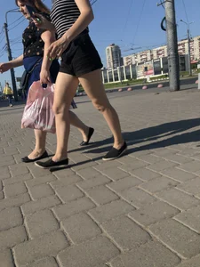 Candid teen in shorts with nice legs and booty street pics