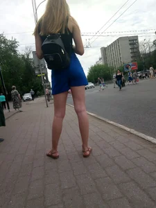 Girl in Shorts and Sandals with Hot Legs Standing on a Bus Stop City Candyd