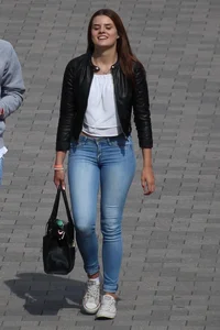 Pretty redhead in tight jeans with a nice booty