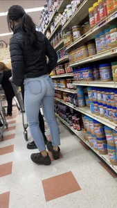 Sexy Asian girl grocery shopping in tight jeans with a nice ass