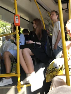 Public bus candid girl in a dress and slim legs in pantyhose