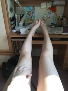 Cute Legs with Very White Skin on Table Home Selfie