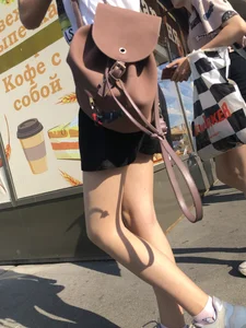 Couple of Skinny Girls in Mini-Skirts And Sneakers Street Photos