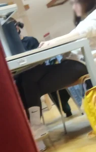 A Nerdy Candid Skinny Girl in Leggings, White Socks And Sneakers Working at the Library Creepshots