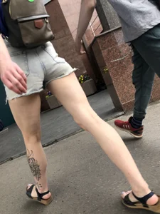 A Gorgeous Tall Ginger Girl in Shorts And Sandals With Tattooed Legs Street Creepshots