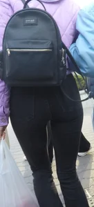 Juicy ass in black tight jeans and nice skinny legs street closeups