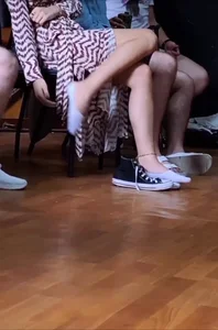 College teen in white socks taking off her sneakers video