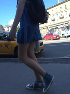 Girl in a Skirt With Sexy Skinny Legs Walking Down a Street Creepshots Collection