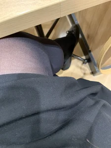 Candid College Teen's Legs in a Skirt And Black Pantyhose Selfie at a Desk in a Classroom