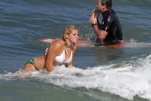 Candid surfer babes on the beach and in bikinis