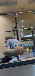 Asian MILF squatting at the gym (OC)