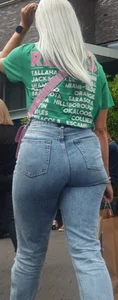 Blonde girl wearing blue jeans with a great ass street creepshots
